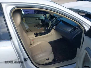 2015 Ford Taurus SEL z VIN 1FAHP2E81FG105404, wystawiony jako IAAI lot #40888773 z przebiegiem Nie podano mil oraz . Historia ofert i sprzedaży dostępna na DreamBid. Obrazek 8.