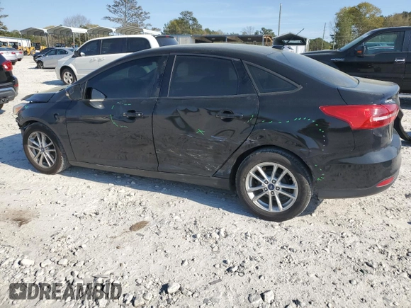 2017 Ford Focus SE with VIN 1FADP3F26HL331253, listed as a Copart auction lot 50869865 with 60,776 mi miles and Salvage title. Bid and sale history available at DreamBid. Image 2.