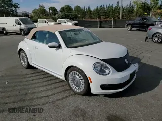 2015 Volkswagen Beetle 1.8T with VIN 3VW517AT6FM802771, listed as a Copart auction lot 72225834 with 128,946 mi miles and Salvage title. Bid and sale history available at DreamBid. Image 11.