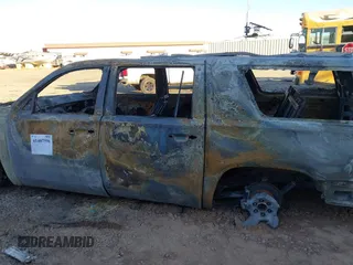 2019 Chevrolet Suburban LT with VIN 1GNSCHKC2KR395939, listed as a IAAI auction lot 41407596 with Not Provided miles and . Bid and sale history available at DreamBid. Image 13.