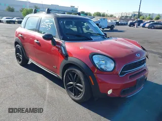 2016 MINI Countryman S with VIN WMWZC5C50GWU02754, listed as a IAAI auction lot 42702055 with 105,284 mi miles and . Bid and sale history available at DreamBid. Image 13.