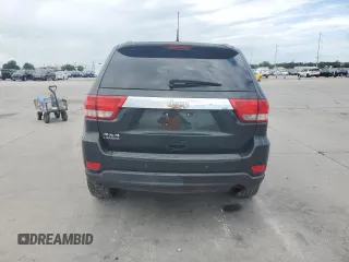 2011 Jeep Grand Cherokee Laredo z VIN 1J4RR4GG1BC520579, wystawiony jako Copart lot #60860794 z przebiegiem 196 271 mil mil oraz Szkoda całkowita • Salvage title. Historia ofert i sprzedaży dostępna na DreamBid. Obrazek 6.
