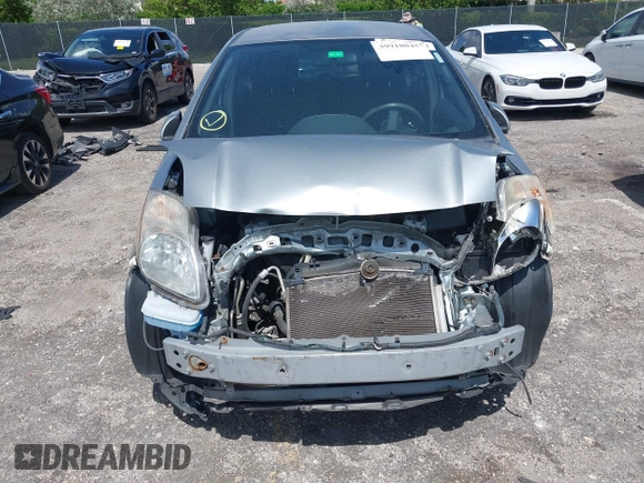 2010 Toyota Yaris with VIN JTDKT4K31A5318793, listed as a IAAI auction lot 39910045 with 192,737 mi miles. Bid and sale history available at carsss.com. Image 13.