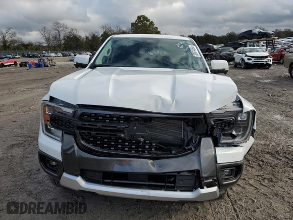 2024 Ford Ranger LARIAT with VIN 1FTER4KH8RLE25001, listed as a Copart auction lot 80974064 with 9,026 mi miles and Salvage Title. Bid and sale history available at carsss.com. Image 5.