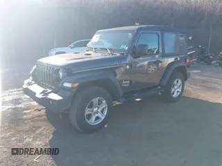 2020 Jeep Wrangler Sport S with VIN 1C4GJXAN8LW207543, listed as a IAAI auction lot 41630531 with 22,621 mi miles and . Bid and sale history available at DreamBid. Image 2.