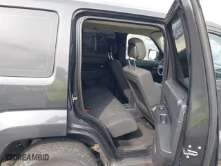 2011 Jeep Liberty Sport with VIN 1J4PN2GK2BW581496, listed as a IAAI auction lot 42080245 with 171,626 mi miles. Bid and sale history available at carsss.com. Image 8.