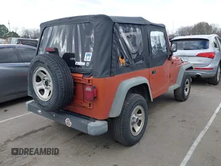 2000 Jeep Wrangler SE with VIN 1J4FA29P2YP804574, listed as a IAAI auction lot 41723297 with 172,991 mi miles. Bid and sale history available at carsss.com. Image 4.