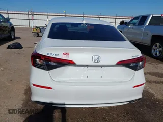 2022 Honda Civic Sport z VIN 2HGFE2F54NH599290, wystawiony jako IAAI lot #42212435 z przebiegiem 49 012 mil mil oraz . Historia ofert i sprzedaży dostępna na DreamBid. Obrazek 17.