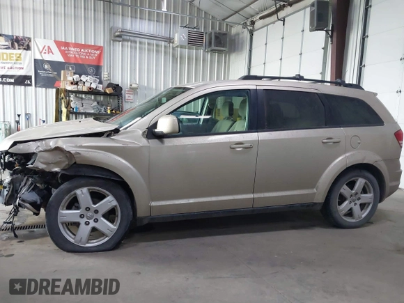 2010 Dodge Journey SXT with VIN 3D4PH5FVXAT180831, listed as a IAAI auction lot 41506328 with 155,482 mi miles. Bid and sale history available at carsss.com. Image 14.