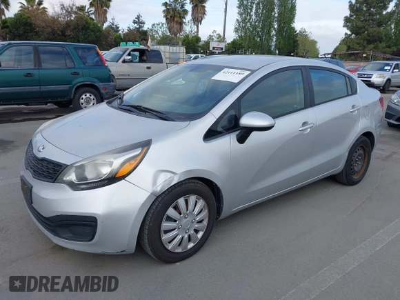 2014 Kia Rio LX with VIN KNADM4A3XE6363851, listed as a IAAI auction lot 42111189 with 144,122 mi miles and . Bid and sale history available at DreamBid. Image 2.
