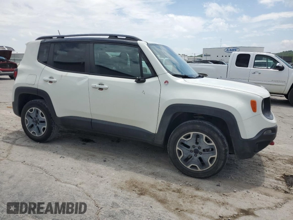 2015 Jeep Renegade Trailhawk with VIN ZACCJBCT2FPB85764, listed as a Copart auction lot 58965465 with 80,440 mi miles and Salvage title. Bid and sale history available at DreamBid. Image 4.