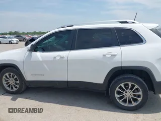 2019 Jeep Cherokee Latitude Plus with VIN 1C4PJLLBXKD220221, listed as a IAAI auction lot 42060125 with 89,452 mi miles and . Bid and sale history available at DreamBid. Image 14.