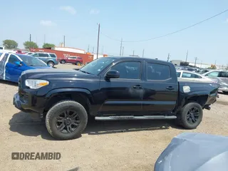 2018 Toyota Tacoma SR with VIN 5TFAX5GN5JX126118, listed as a IAAI auction lot 41949791 with 37,615 mi miles and . Bid and sale history available at DreamBid. Image 14.
