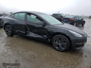 2023 Tesla Model 3 with VIN 5YJ3E1EA0PF455450, listed as a Copart auction lot 45423875 with 73,471 mi miles and Salvage Title. Bid and sale history available at carsss.com. Image 4.