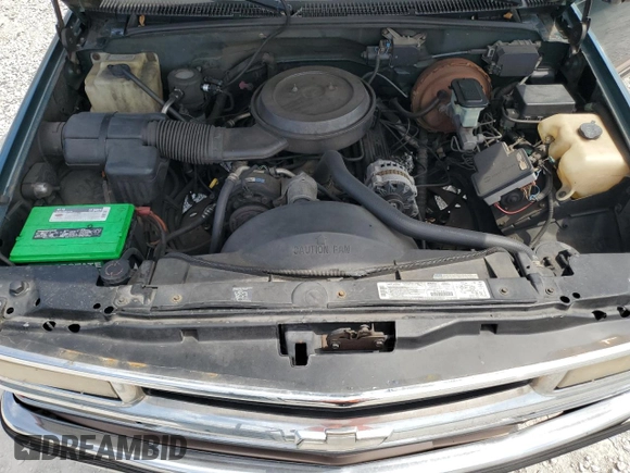 1995 Chevrolet Tahoe z VIN 1GNEC13K1SJ439759, wystawiony jako Copart lot #57784845 z przebiegiem 190 566 mil mil oraz Czysty tytuł • Clean title. Historia ofert i sprzedaży dostępna na DreamBid. Obrazek 11.