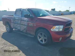 2014 Ram 1500 Express z VIN 1C6RR6FTXES311021, wystawiony jako IAAI lot #42095989 z przebiegiem 138 862 mil mil oraz . Historia ofert i sprzedaży dostępna na DreamBid. Obrazek 1.