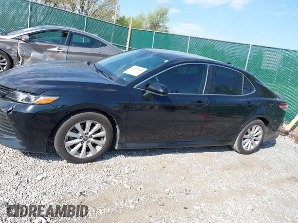 2019 Toyota Camry LE with VIN 4T1B11HK1KU718374, listed as a IAAI auction lot 42071905 with 86,460 mi miles and . Bid and sale history available at DreamBid. Image 14.