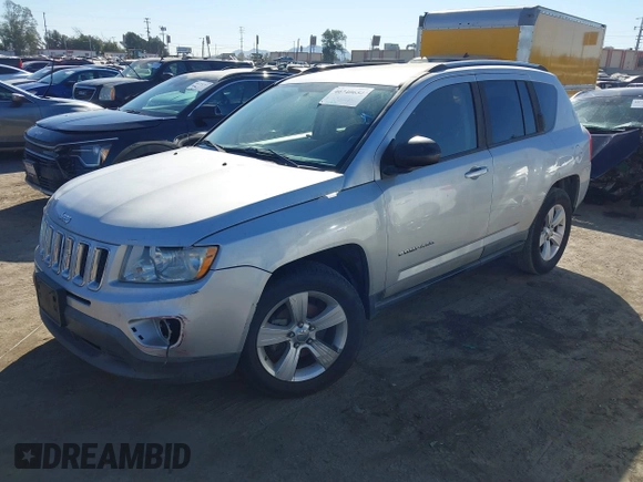 2011 Jeep Compass Latitude with VIN 1J4NT1FBXBD138744, listed as a IAAI auction lot 40740652 with 151,721 mi miles. Bid and sale history available at carsss.com. Image 2.