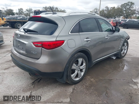 2009 Infiniti FX with VIN JNRAS18U39M101020, listed as a IAAI auction lot 41663215 with 210,583 mi miles and . Bid and sale history available at DreamBid. Image 4.