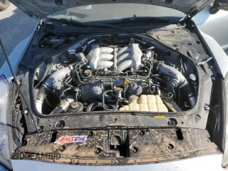 2009 Nissan GT-R Premium z VIN JN1AR54F49M252803, wystawiony jako Copart lot #75776124 z przebiegiem Nie podano mil oraz Nie do naprawy • Non repairable. Historia ofert i sprzedaży dostępna na DreamBid. Obrazek 11.