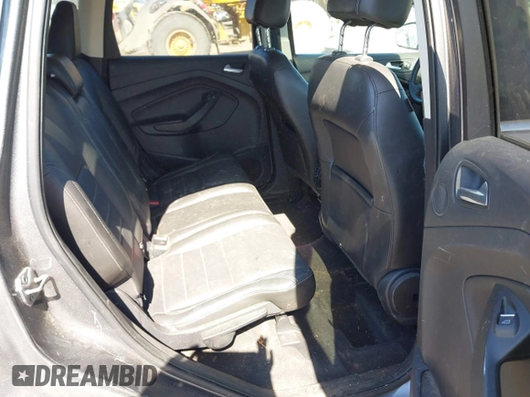2013 Ford Escape SEL with VIN 1FMCU9H98DUB89046, listed as a IAAI auction lot 41794795 with 89,819 mi miles and . Bid and sale history available at DreamBid. Image 8.