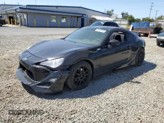 2015 Scion FR-S z VIN JF1ZNAA10F9700374, wystawiony jako Copart lot #53919375 z przebiegiem 109 180 mil mil oraz Szkoda całkowita • Salvage title. Historia ofert i sprzedaży dostępna na DreamBid. Obrazek 1.