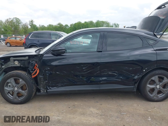 2021 Ford Mustang Mach-E Select with VIN 3FMTK1SS4MMA21329, listed as a IAAI auction lot 42241810 with 35,700 mi miles and . Bid and sale history available at DreamBid. Image 20.