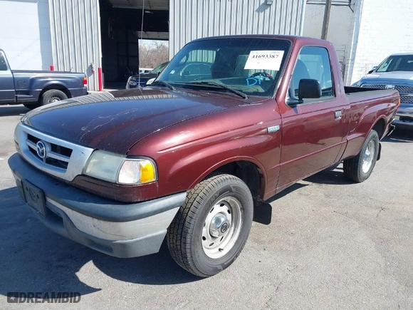 2003 Mazda B-Series 2WD Truck SX with VIN 4F4YR12D03TM09575, listed as a IAAI auction lot 41693387 with 173,882 mi miles. Bid and sale history available at carsss.com. Image 2.