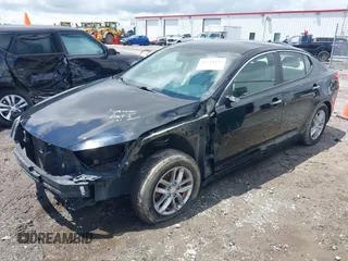 2013 Kia Optima LX z VIN 5XXGM4A71DG254889, wystawiony jako IAAI lot #42248455 z przebiegiem 203 443 mil mil oraz . Historia ofert i sprzedaży dostępna na DreamBid. Obrazek 2.
