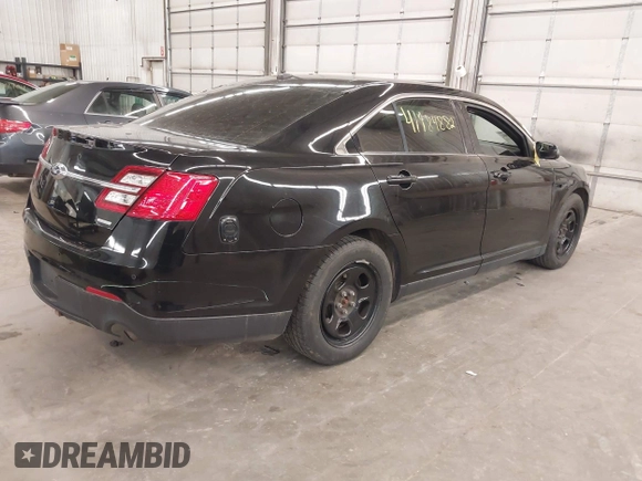 2016 Ford Sedan Police Interceptor with VIN 1FAHP2MT5GG132337, listed as a IAAI auction lot 41984882 with 1 mi miles. Bid and sale history available at carsss.com. Image 4.