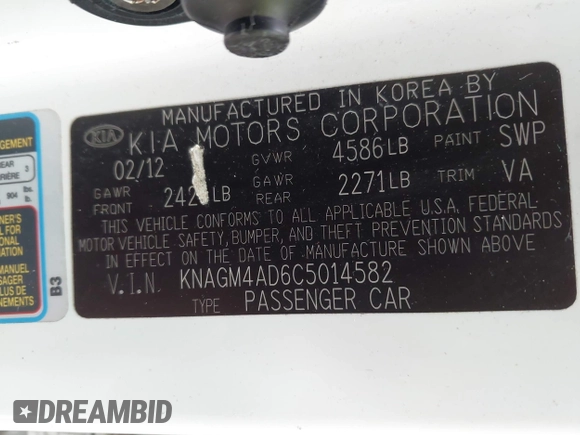 2012 Kia Optima Hybrid with VIN KNAGM4AD6C5014582, listed as a IAAI auction lot 42186511 with 172,517 mi miles. Bid and sale history available at carsss.com. Image 9.
