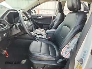 2020 Ford Escape Titanium z VIN 1FMCU9J91LUB53076, wystawiony jako Copart lot #64008765 z przebiegiem Nie podano mil oraz Nie do naprawy • Non repairable. Historia ofert i sprzedaży dostępna na DreamBid. Obrazek 7.