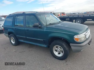 1996 Ford Explorer XL z VIN 1FMDU34X1TUCO1607, wystawiony jako IAAI lot #41182134 z przebiegiem 200 982 mil mil oraz . Historia ofert i sprzedaży dostępna na DreamBid. Obrazek 1.