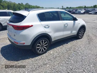 2017 Kia Sportage EX with VIN KNDPNCACXH7079500, listed as a IAAI auction lot 42051156 with 100,928 mi miles and . Bid and sale history available at DreamBid. Image 4.