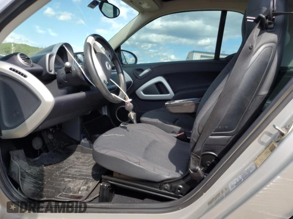 2011 Smart fortwo Pure with VIN WMEEJ3BA8BK429292, listed as a Copart auction lot 72915554 with 126,673 mi miles and Salvage title. Bid and sale history available at DreamBid. Image 7.