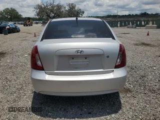 2006 Hyundai Accent GLS z VIN KMHCN46C46U060741, wystawiony jako Copart lot #59560575 z przebiegiem 93 966 mil mil oraz Szkoda całkowita • Salvage title. Historia ofert i sprzedaży dostępna na DreamBid. Obrazek 6.