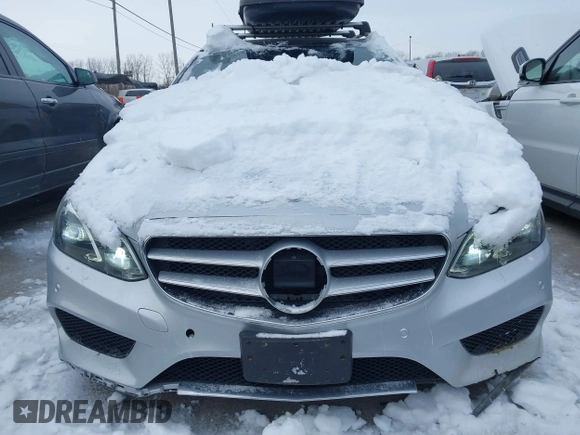 2016 Mercedes-Benz E-Class E 350 Luxury with VIN WDDHH8JBXGB335197, listed as a IAAI auction lot 41344354 with 96,164 mi miles. Bid and sale history available at carsss.com. Image 12.