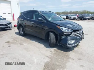 2018 Hyundai Santa Fe 2.4L z VIN 5NMZUDLB3JH066186, wystawiony jako IAAI lot #42135546 z przebiegiem 89 511 mil mil oraz . Historia ofert i sprzedaży dostępna na DreamBid. Obrazek 1.