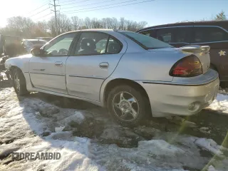 2002 Pontiac Grand Am GT1 with VIN 1G2NV52E52M626348, listed as a Copart auction lot 87703175 with 91,215 mi miles and Salvage Title. Bid and sale history available at carsss.com. Image 2.