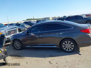 2016 Hyundai Sonata 2.4L Sport with VIN 5NPE34AF8GH407309, listed as a IAAI auction lot 41711709 with 127,460 mi miles. Bid and sale history available at carsss.com. Image 14.