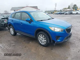 2014 Mazda CX-5 Sport with VIN JM3KE4BE6E0336504, listed as a IAAI auction lot 41961244 with 125,150 mi miles. Bid and sale history available at carsss.com. Image 1.
