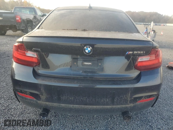 2016 BMW 2 Series M235i xDrive with VIN WBA1J9C57GV371986, listed as a Copart auction lot 77871604 with 0 mi miles and Salvage Title. Bid and sale history available at carsss.com. Image 6.