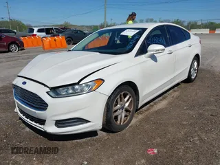 2016 Ford Fusion SE with VIN 3FA6P0H79GR165486, listed as a IAAI auction lot 42052490 with 141,927 mi miles. Bid and sale history available at carsss.com. Image 2.