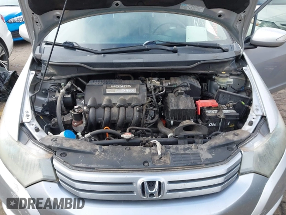 2010 Honda Insight EX with VIN JHMZE2H77AS022538, listed as a IAAI auction lot 41804579 with 184,000 mi miles and . Bid and sale history available at DreamBid. Image 10.