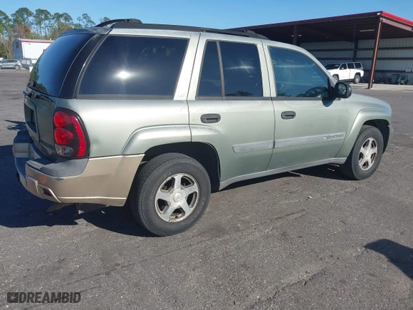 2004 Chevrolet TrailBlazer LS with VIN 1GNDT13S942209802, listed as a IAAI auction lot 41842521 with 197,319 mi miles. Bid and sale history available at carsss.com. Image 4.
