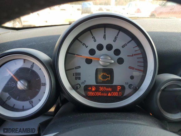 2009 MINI Cooper Convertible with VIN WMWMR33559TU96728, listed as a Copart auction lot 77949004 with 86,084 mi miles and Clean Title. Bid and sale history available at carsss.com. Image 9.