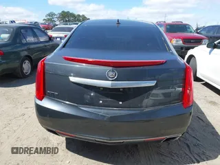 2013 Cadillac XTS Premium with VIN 2G61S5S33D9113653, listed as a IAAI auction lot 41837117 with 101,049 mi miles and . Bid and sale history available at DreamBid. Image 15.