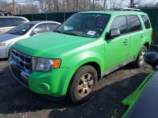 2012 Ford Escape Limited with VIN 1FMCU9E70CKA11998, listed as a IAAI auction lot 41798516 with 999,999 mi miles. Bid and sale history available at carsss.com. Image 2.