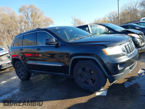 2011 Jeep Grand Cherokee 70th Anniversary with VIN 1J4RR4GT8BC504618, listed as a IAAI auction lot 40993960 with 188,098 mi miles. Bid and sale history available at carsss.com. Image 13.