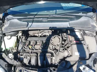 2013 Ford Focus SE z VIN 1FADP3F22DL121744, wystawiony jako IAAI lot #41743289 z przebiegiem 121 940 mil mil oraz . Historia ofert i sprzedaży dostępna na DreamBid. Obrazek 10.